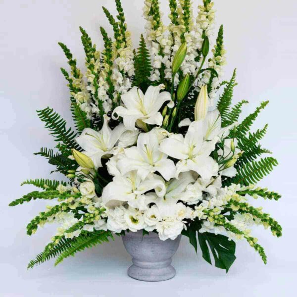arreglo floral blanco puerta del cielo